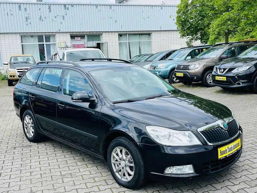 Gebraucht Skoda Octavia Ambition 105 PS (77 kW) 2012 Schwarz Kombi