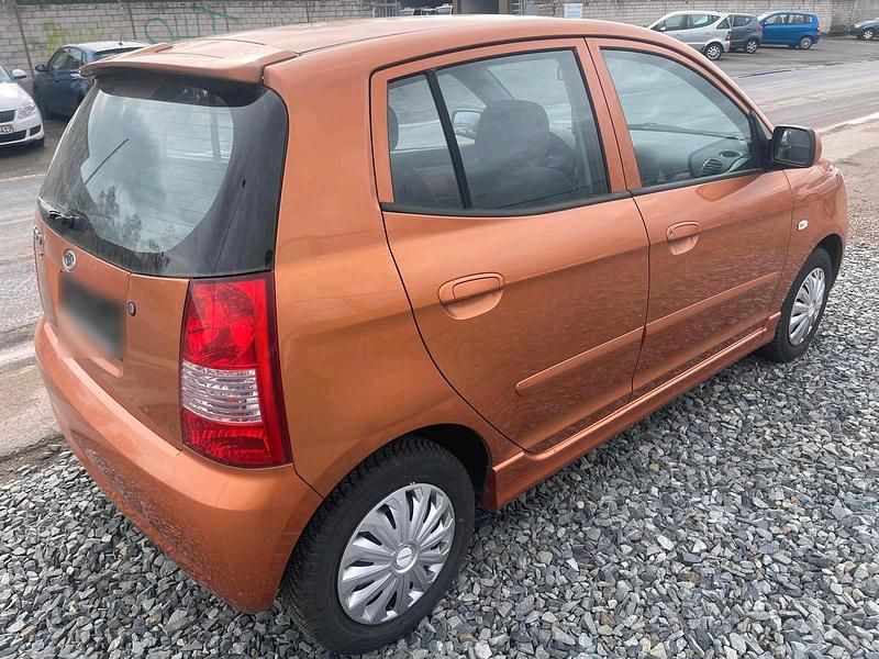 Second-hand Kia Picanto 55 CP (40 kW) 2006 Portocaliu Hatchback