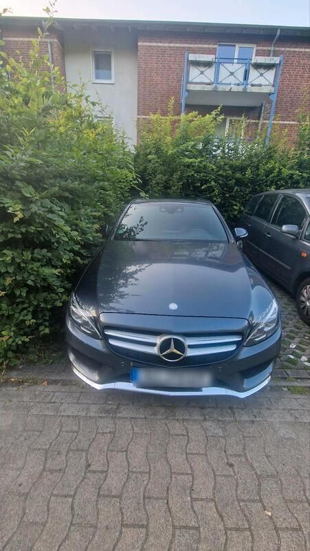Grau Gebraucht 2015 Mercedes C250 AMG Limousine | 16.399 € (Superpreis) - Bild 1/4