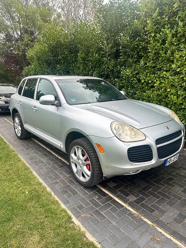 Silber Gebraucht 2009 Porsche Cayenne Turbo SUV | 9.999 € - Bild 1/4