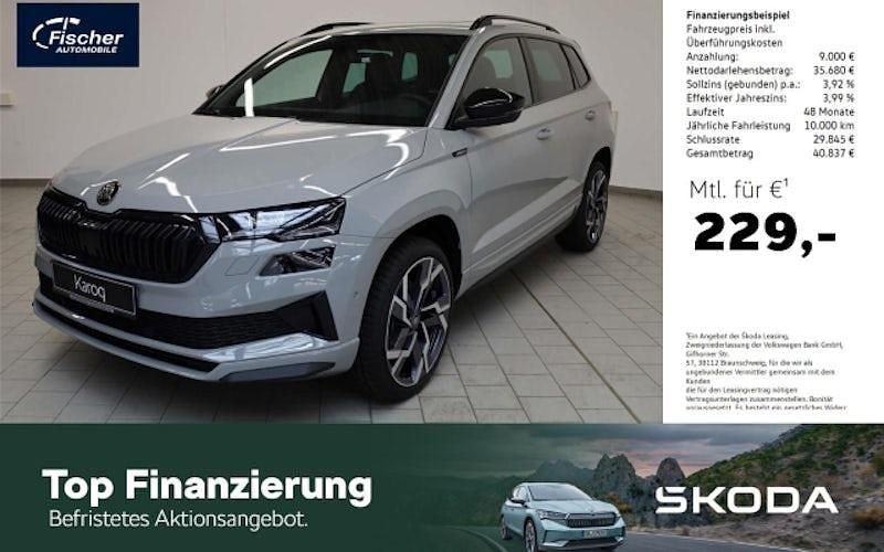 Grau Neu 2025 Skoda Karoq SportLine SUV | 44.680 € - Bild 1/4