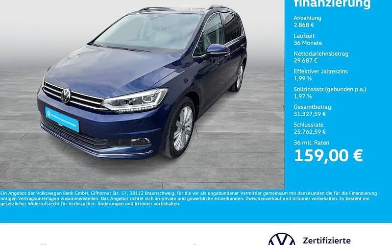 Atlantik blue metallic Gebraucht 2024 VW Touran Highline Van / Kleinbus | 32.555 € (Guter Preis) - Bild 1/4