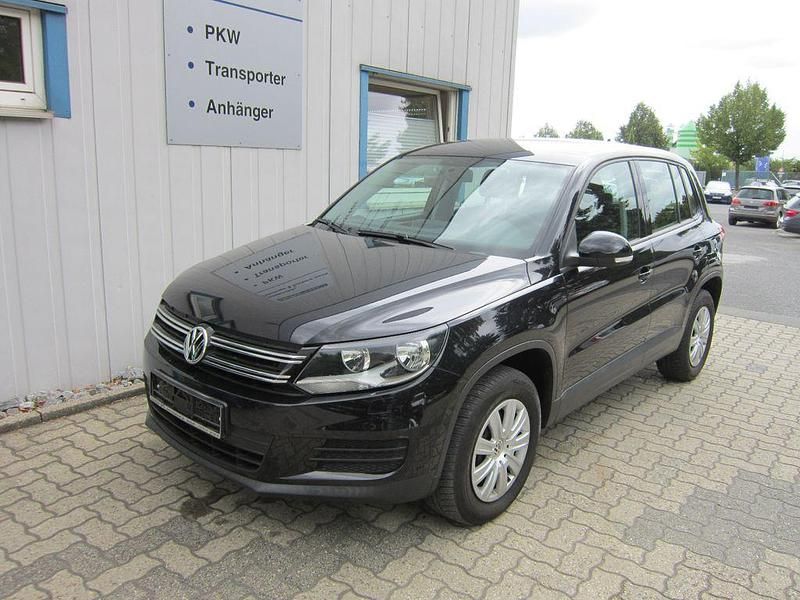 Deep black perleffekt Gebraucht 2014 VW Tiguan Trendline SUV | 13.490 € (Fairer Preis) - Bild 1/4