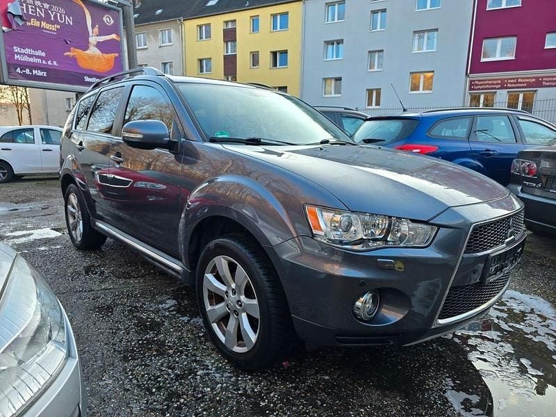 Grau Gebraucht 2012 Mitsubishi Outlander SUV | 7.900 € (Fairer Preis) - Bild 1/4