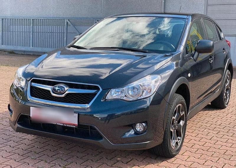 Grau Gebraucht 2013 Subaru XV Active SUV | 11.369 € (Teuer) - Bild 1/4