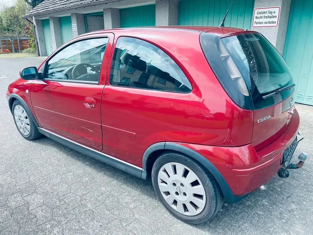Używany Opel Corsa 80 KM (58 kW) 2006 Pomarańczowy Hatchback