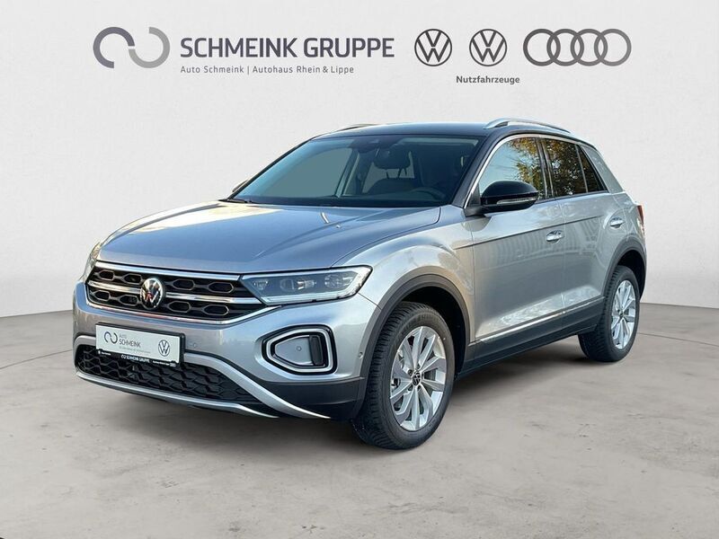 Pyritsilber metallic schwarz Gebraucht 2025 VW T-Roc Style SUV | 29.880 € (Teuer) - Bild 1/4
