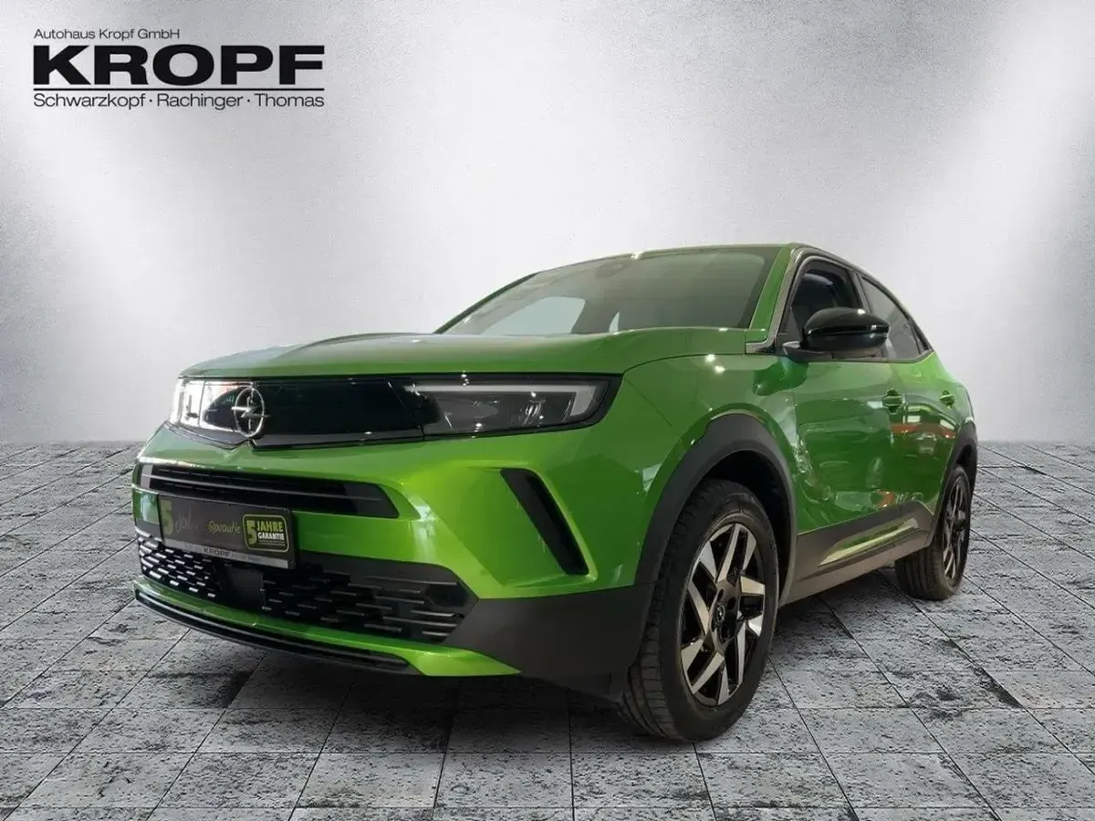 Gebraucht Opel Mokka Elegance 131 PS (96 kW) 2024 Lackierung matcha green/typ au SUV