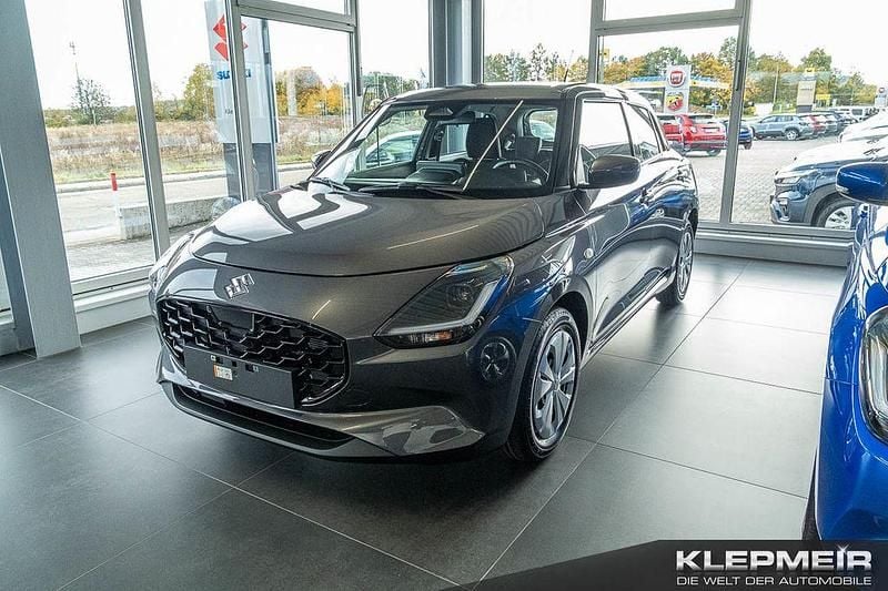 Mineral grey Neu 2025 Suzuki Swift Club Limousine | 18.980 € - Bild 1/4