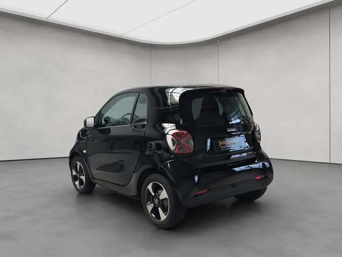 Gebraucht Smart ForTwo Coupé Passion Exclusive 60 kW (82 PS) 2024 Bodypanels in black Kleinwagen