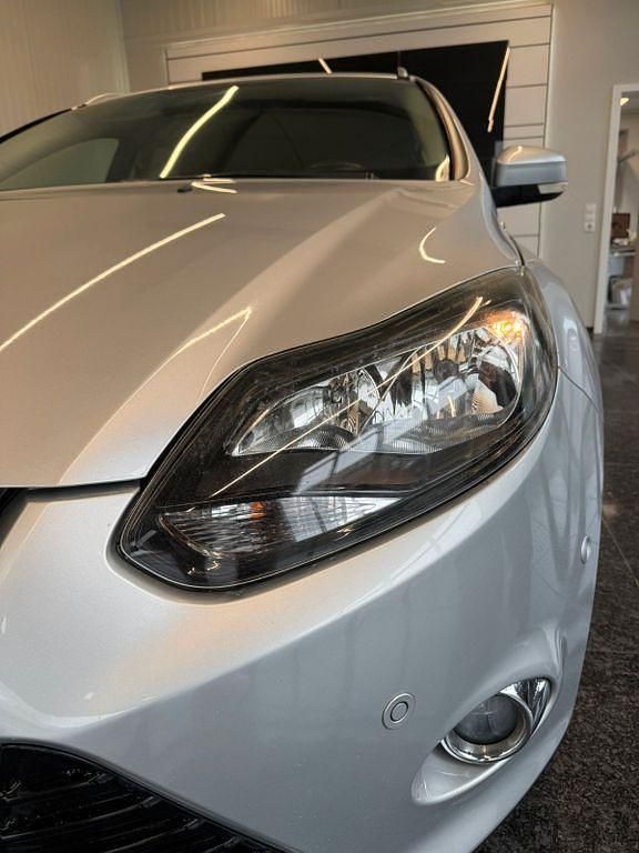 Second-hand Ford Focus Titanium 140 CP (102 kW) 2012 Argintiu Berlinǎ