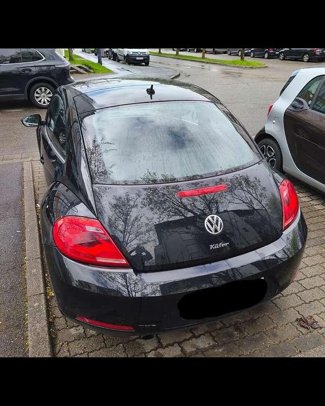 Gebraucht VW Beetle 105 PS (77 kW) 2012 Schwarz Kleinwagen