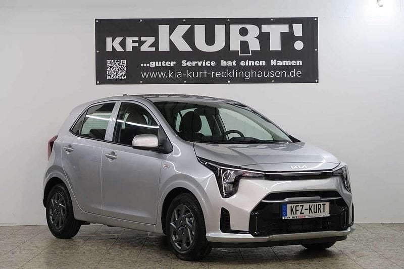 Sparklingsilber (metallic) Gebraucht 2024 Kia Picanto Vision Kleinwagen | 16.490 € (Fairer Preis) - Bild 1/4