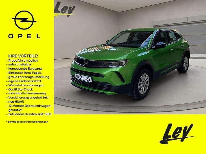 Matcha gruen Gebraucht 2021 Opel Mokka-e Basis SUV | 14.990 € (Fairer Preis) - Bild 1/4