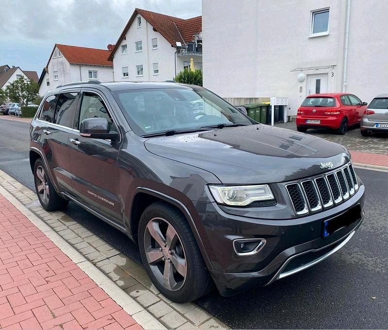 Grau Gebraucht 2015 Jeep Grand Cherokee Overland SUV | 10.500 € - Bild 1/4
