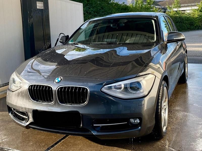 Grau Gebraucht 2011 BMW 118 Sport Line Kleinwagen | 7.900 € (Etwas zu teuer) - Bild 1/4