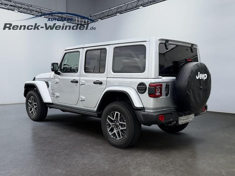 Gebraucht Jeep Wrangler Unlimited Sahara 272 PS (200 kW) 2024 Silber SUV