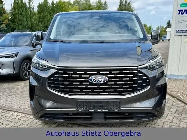 Gebraucht Ford Tourneo 170 PS (125 kW) 2024 Grau (magneticgrau (metallic)) Van / Kleinbus