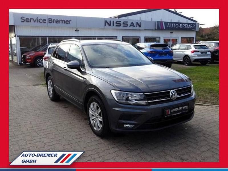 Grau grau (metallic) Gebraucht 2018 VW Tiguan Trendline SUV | 17.990 € (Etwas zu teuer) - Bild 1/4