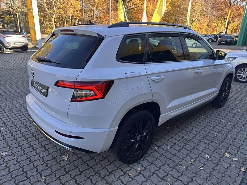 Gebraucht Skoda Karoq SportLine 150 PS (110 kW) 2019 Moon white metallic SUV