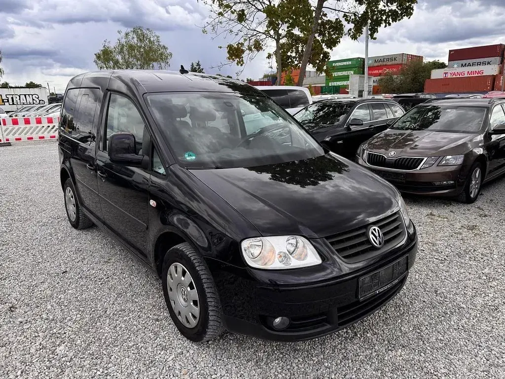 Second-hand VW Caddy Team 80 CP (58 kW) 2010 Negru Monovolum