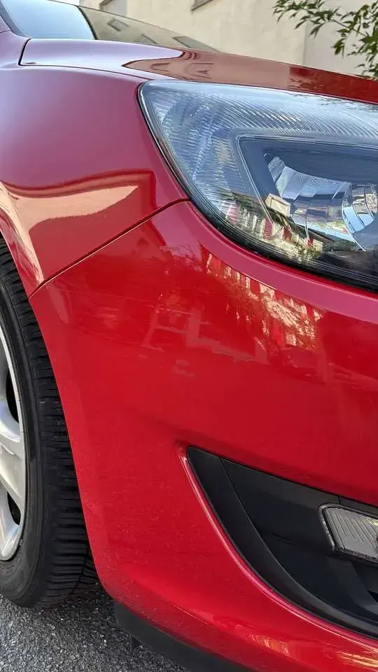 Gebraucht Opel Astra Edition 120 PS (88 kW) 2015 Rot Kleinwagen