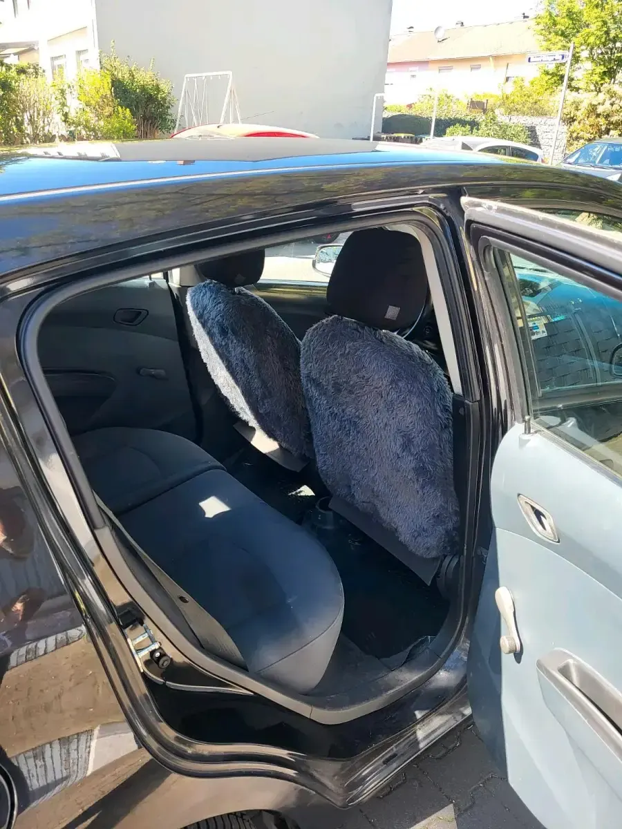 Second-hand Chevrolet Spark 68 CP (50 kW) 2012 Negru Hatchback