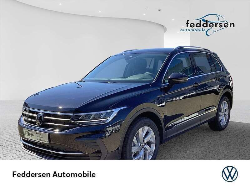 Deep black perleffekt (metallic) Gebraucht 2023 VW Tiguan Move SUV | 34.437 € (Fairer Preis) - Bild 1/4