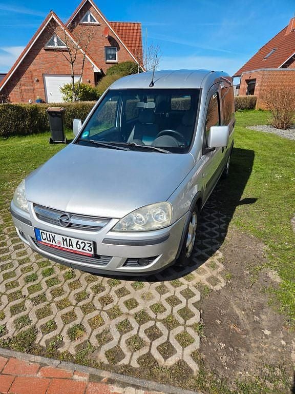 Second-hand Opel Combo Edition 90 CP (66 kW) 2011 Argintiu Monovolum