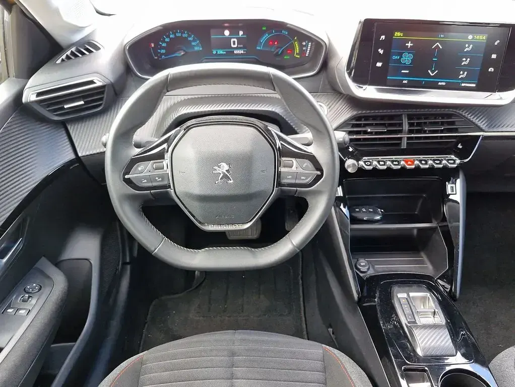 Gebraucht Peugeot e-208 Active 100 kW (136 PS) 2022 Faro gelb metallic (metallic) Kleinwagen