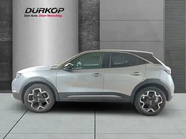 Gebraucht Opel Mokka Ultimate 131 PS (96 kW) 2022 Kontrast grau/quarz silber (metallic) SUV