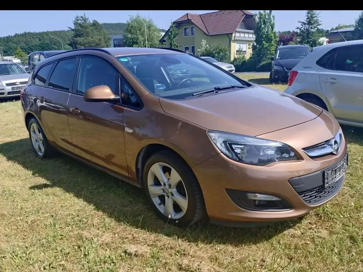 Używany Opel Astra Edition 140 KM (102 kW) 2015 Brązowy Kombi