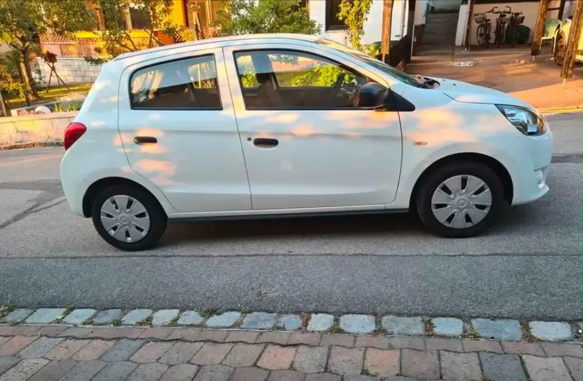 Gebraucht Mitsubishi Space Star 71 PS (52 kW) 2015 Weiß Kleinwagen