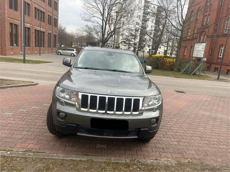 Grau Gebraucht 2013 Jeep Grand Cherokee Overland SUV | 9.500 € (Superpreis) - Bild 1/4