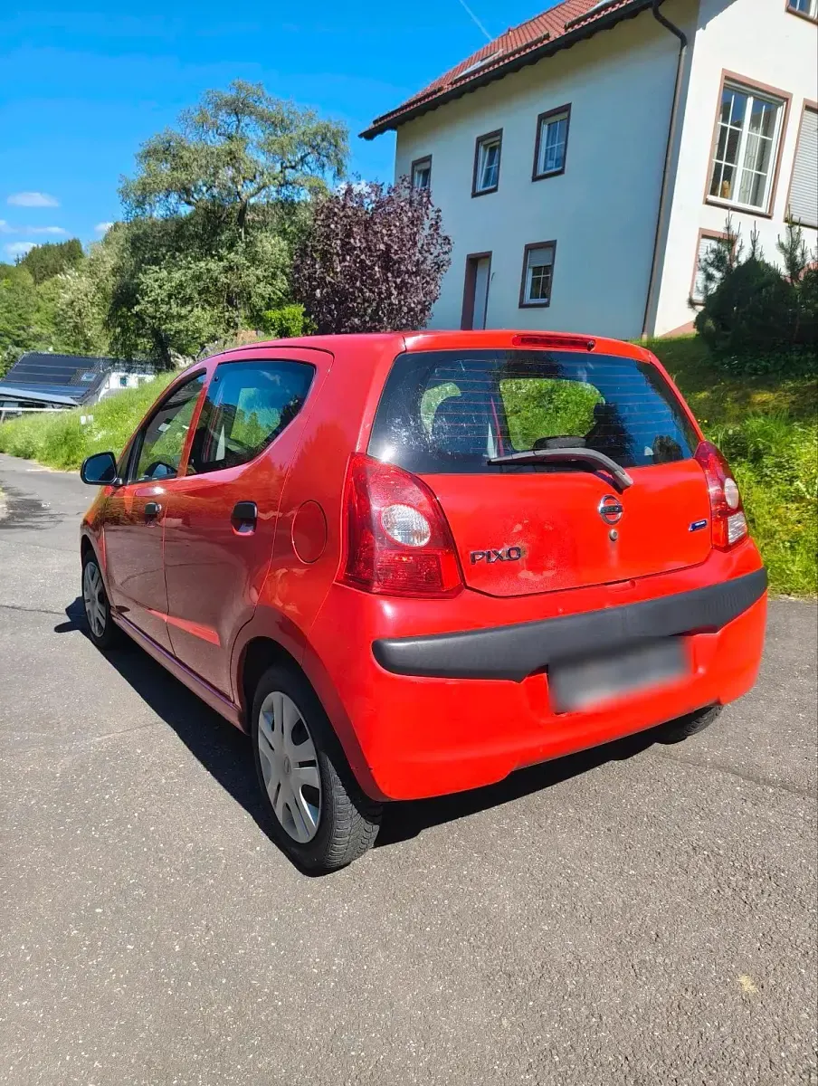 Gebraucht Nissan Pixo 68 PS (50 kW) 2010 Rot Kleinwagen