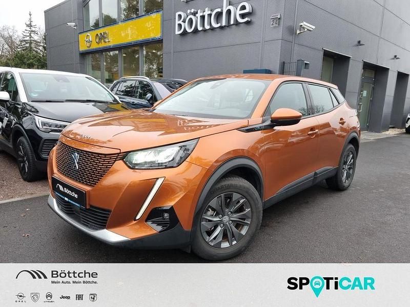 Gebraucht Peugeot e-2008 Active 100 kW (136 PS) 2021 Lackierung orange fusion/typ aussenverkleidung metalliclackierung SUV