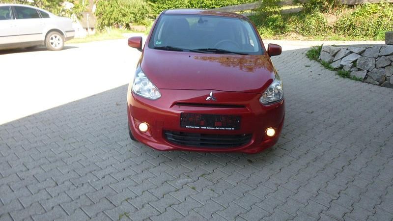 Rot Gebraucht 2015 Mitsubishi Space Star Kleinwagen | 4.100 € - Bild 1/4