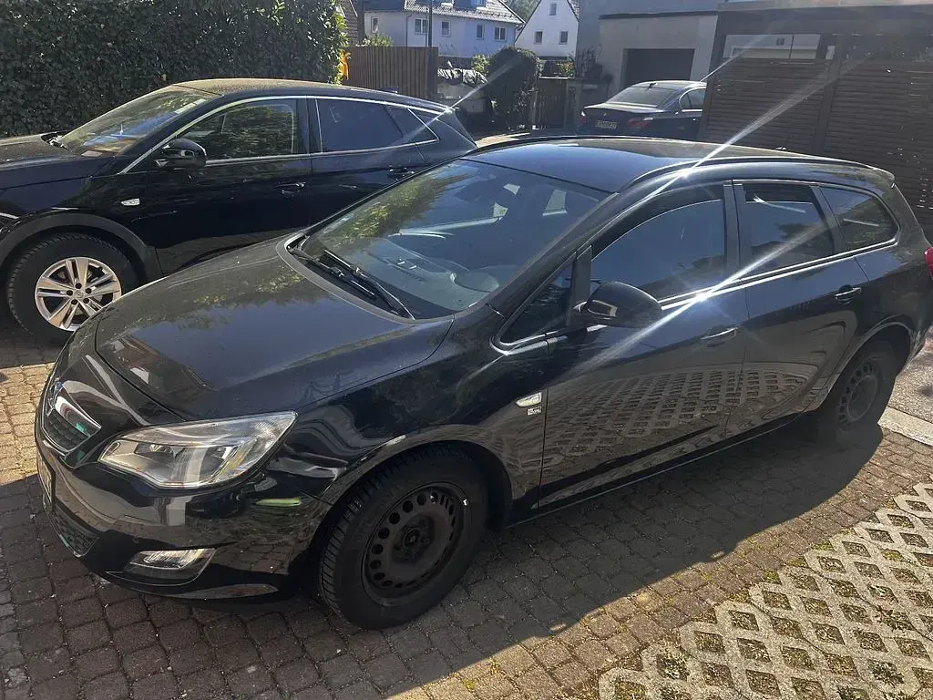 Gebraucht Opel Astra 125 PS (91 kW) 2012 Schwarz Kombi