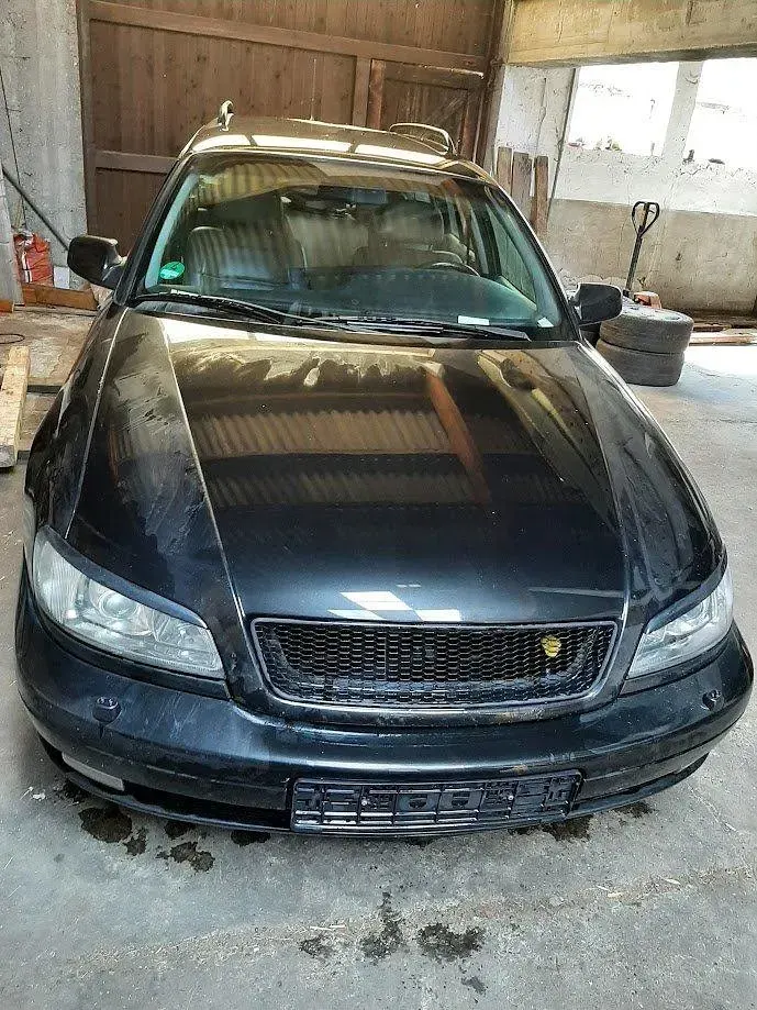 Gebraucht Opel Omega 211 PS (155 kW) 1997 Schwarz Limousine