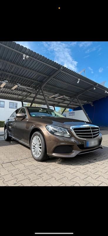 Braun Gebraucht 2014 Mercedes C180 Limousine | 14.999 € - Bild 1/4