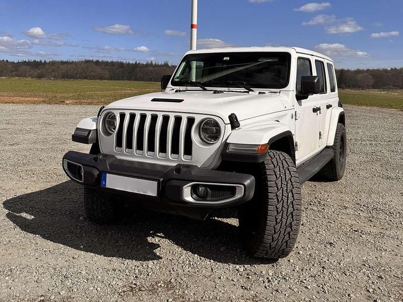 Weiß Gebraucht 2018 Jeep Wrangler Unlimited Sahara SUV | 37.590 € (Fairer Preis) - Bild 1/4