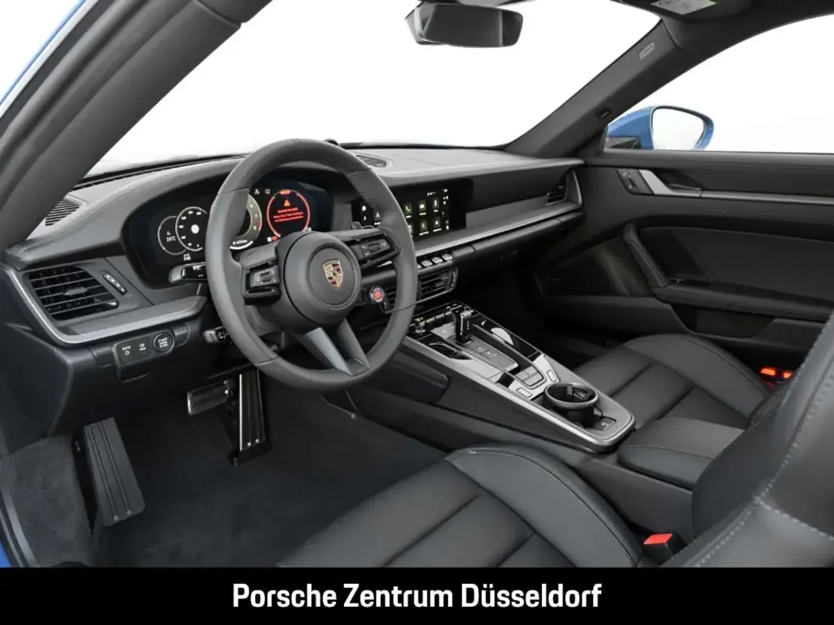 Gebraucht Porsche 911 Carrera 394 PS (289 kW) 2025 Luganoblau Coupé