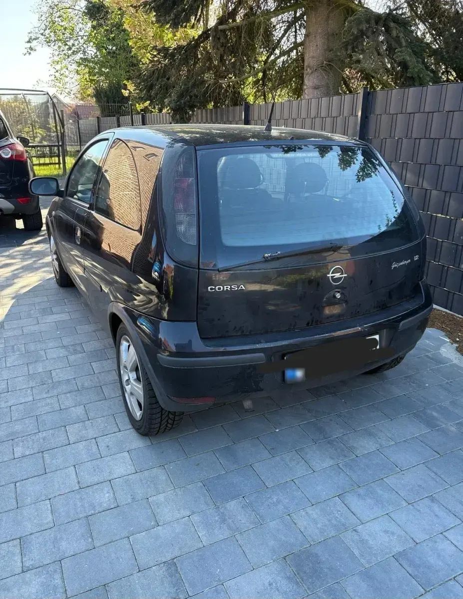 Second-hand Opel Corsa 75 CP (55 kW) 2004 Negru Hatchback