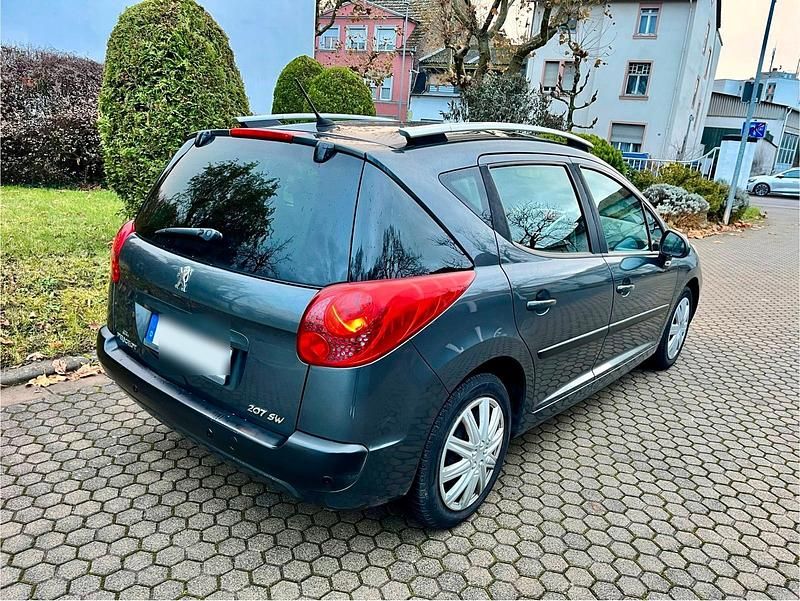 Grau Gebraucht 2009 Peugeot 207 Kombi | 2.100 € (Fairer Preis) - Bild 1/4