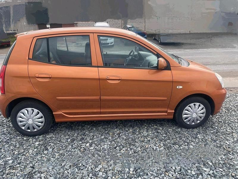 Second-hand Kia Picanto 55 CP (40 kW) 2006 Portocaliu Hatchback