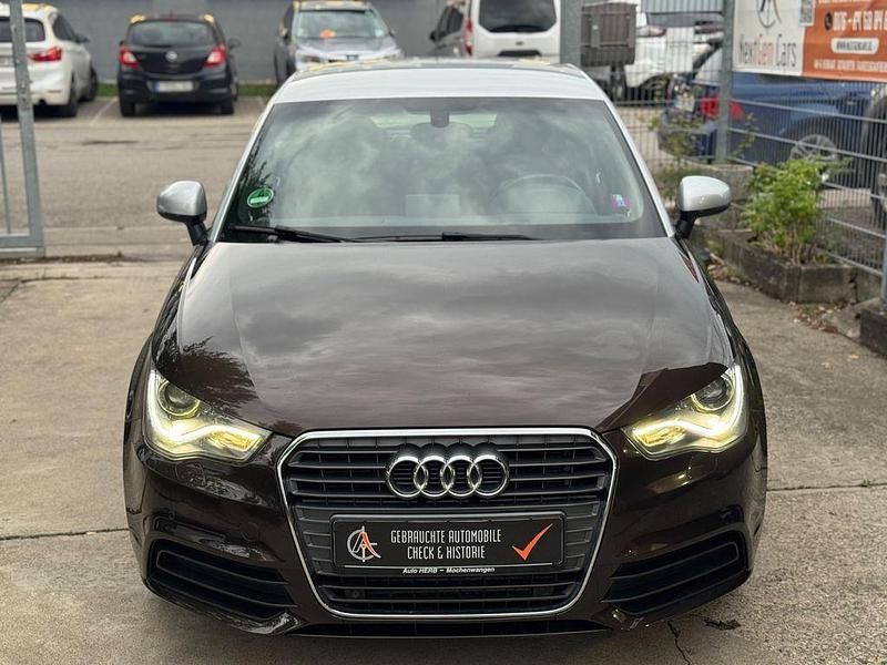 Braun Gebraucht 2013 Audi A1 Sportback Ambiente Kleinwagen | 9.500 € (Fairer Preis) - Bild 1/4