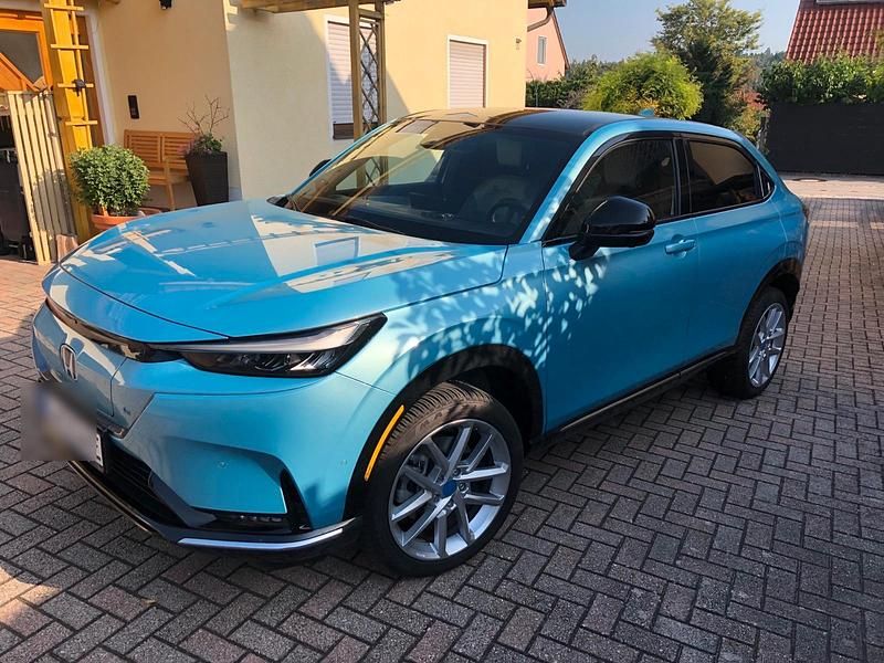 Blau Gebraucht 2023 Honda e:Ny1 Advance SUV | 26.495 € (Fairer Preis) - Bild 1/4