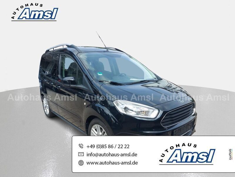 Schwarz Gebraucht 2014 Ford Tourneo Courier Titanium Van / Kleinbus | 9.890 € (Fairer Preis) - Bild 1/4