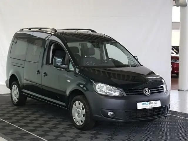 Second-hand VW Caddy Maxi 140 CP (102 kW) 2011 Verde Monovolum