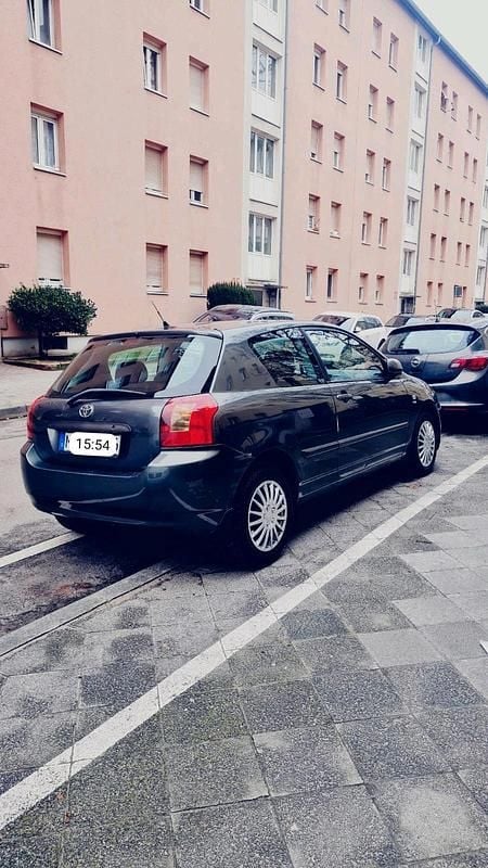 Grau Gebraucht 2003 Toyota Corolla Limousine | 4.300 € (Fairer Preis) - Bild 1/4